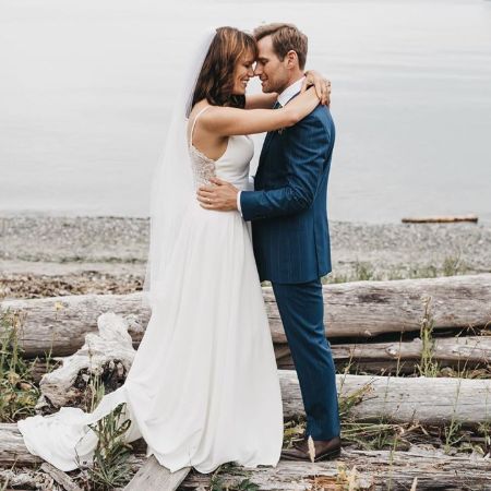 Chad and his spouse, Emily on their wedding day